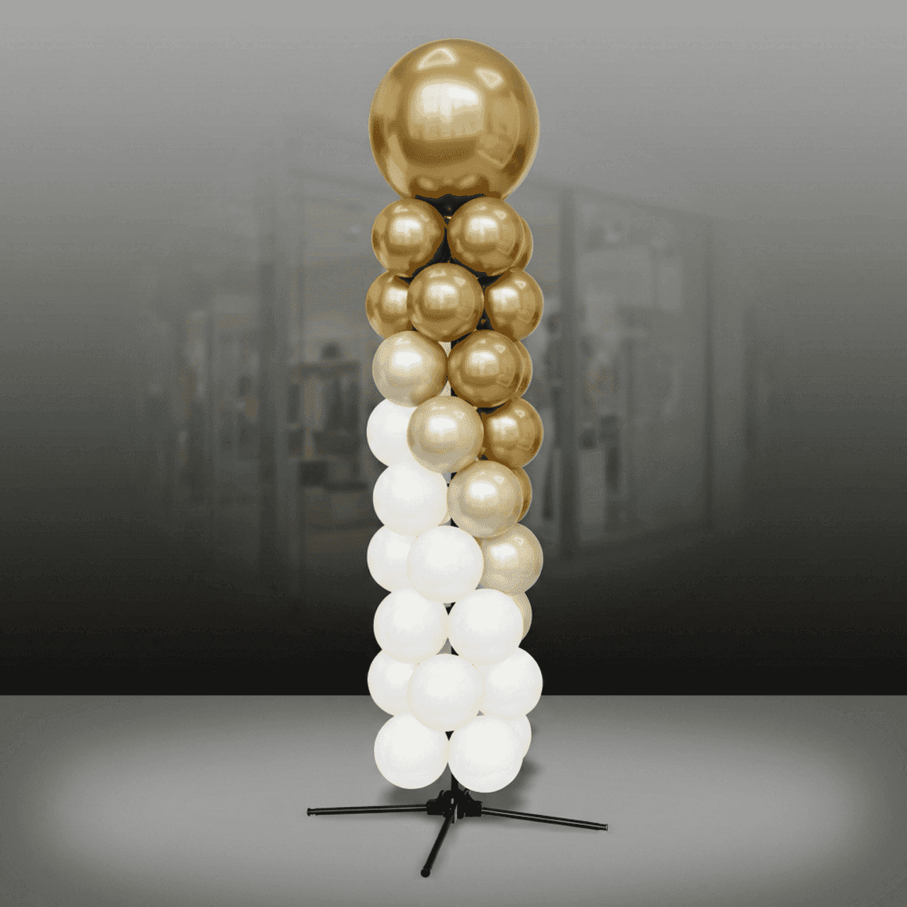 PilaMania Ballonpilaar met grote topbal in retail setting
