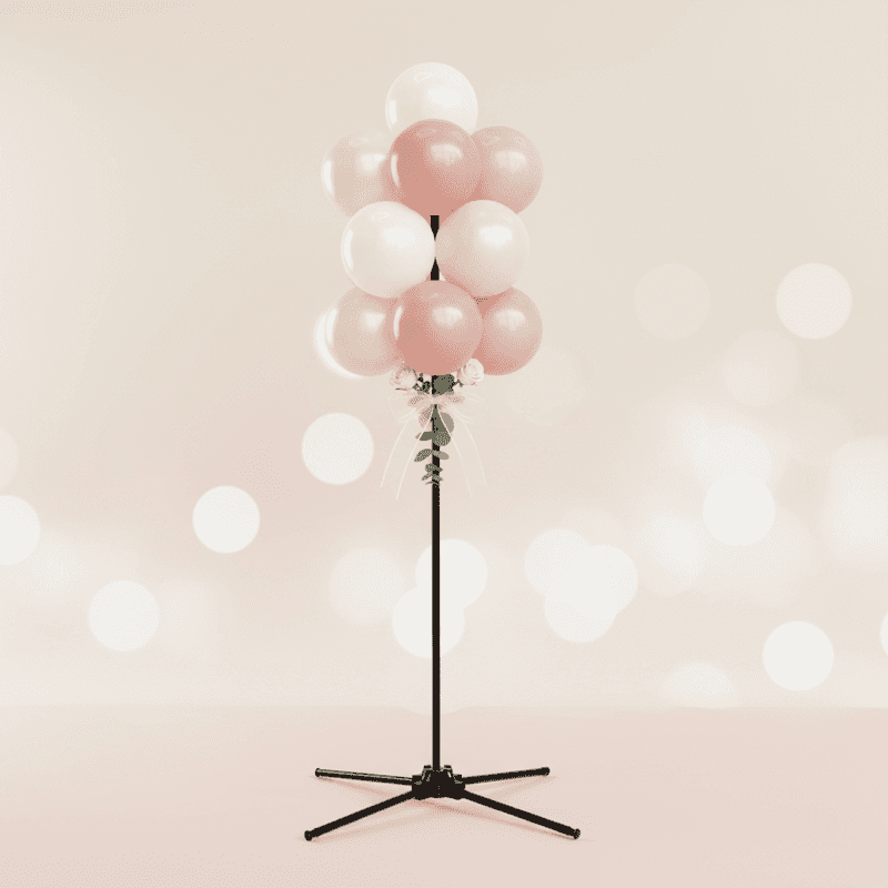 Elegante ballontros in wit en goud voor trouwdecoratie